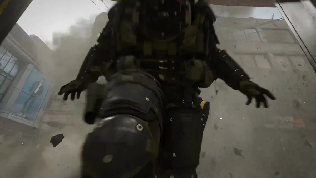 A squad clearing a snow-covered rooftop position at night